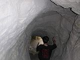 Tibet Guge 08 Tsaparang 08 Tunnels Up To One of the caves proved to be the entrance to a tunnel; that led upwards in a wide curve inside the rock, from time to time lit up by narrow openings in the outer rock-wall. - Lama Anagarika Govinda: The Way of the White Clouds.